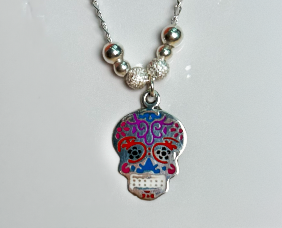 DIJE DE PLATA DE CATRINA