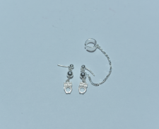 Aretes de plata en forma de buho con cadena 