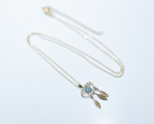 COLLAR OJO Y PLUMAS