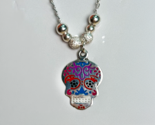 DIJE DE PLATA DE CATRINA