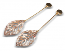 aretes de fantasia largos color dorado con hoja marmoleada en color gris y blanco
