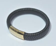 Pulsera de piel negra con broche dorado